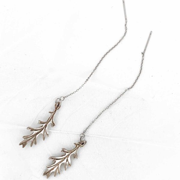 Boucles d’oreilles feuilles célestes dessus