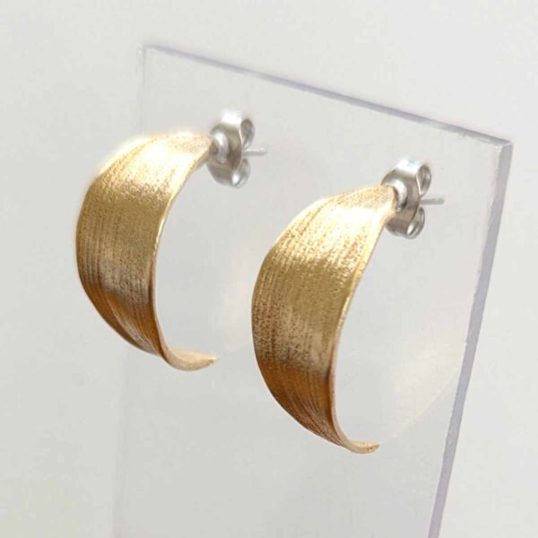 Boucles d'oreilles en bronze Reflets d'Or gauche